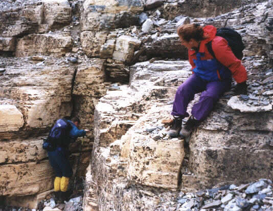 Is he taking a leak in the corner?