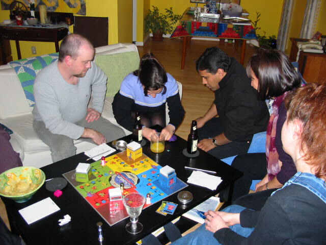 Marcela makes an obscene gesture with play dough.