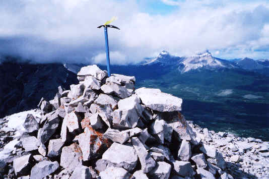 The register is hidden in the rocks at bottom right.