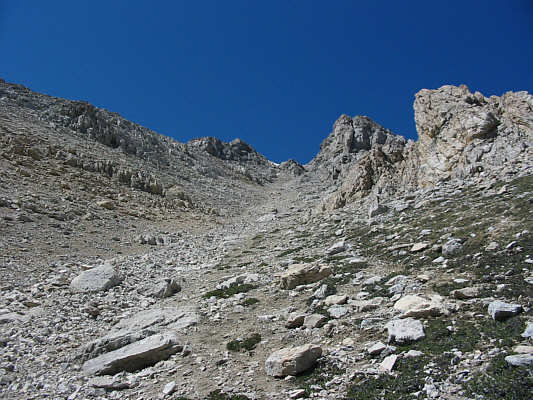 The slabby stuff on either side of the gully might be easier to ascend.