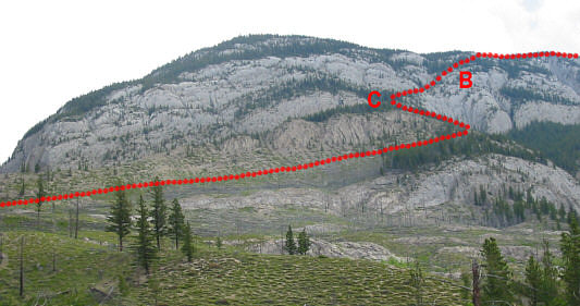 The good trail comes in from the left. The bad or non-existent trail (the one we took) comes in from the right!