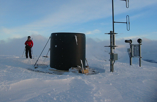 Too bad we couldn't crawl inside that big black thing to get out of the wind.