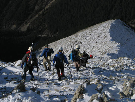 It's probably best to stick to the ridge crest all the way down.