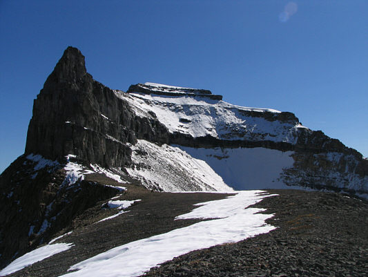 A fresh avalanche had already released on that snow slope at the far end of the basin.