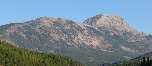 It may be quicker to drive up Alexander Creek and ascend the east face directly.