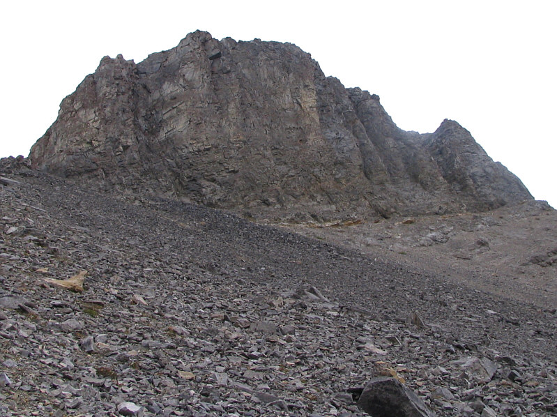 Impressive cliffs for such a small peak.