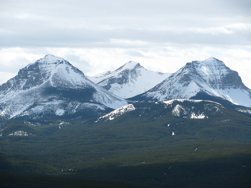 The highest peak is the one on the right.