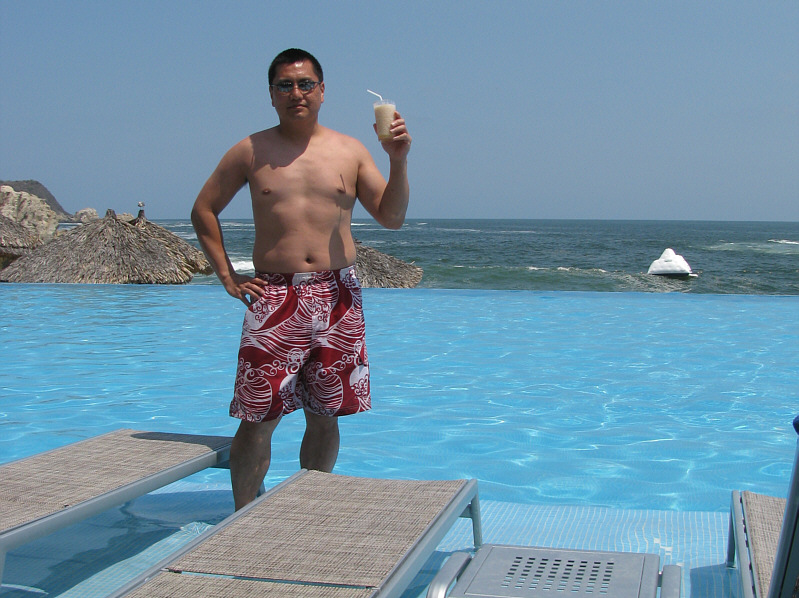 Hmmm...my drink probably still has a better tan than me!