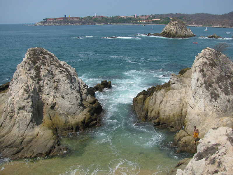 It's a bit dicey scrambling over these jagged rocks in flip flops.