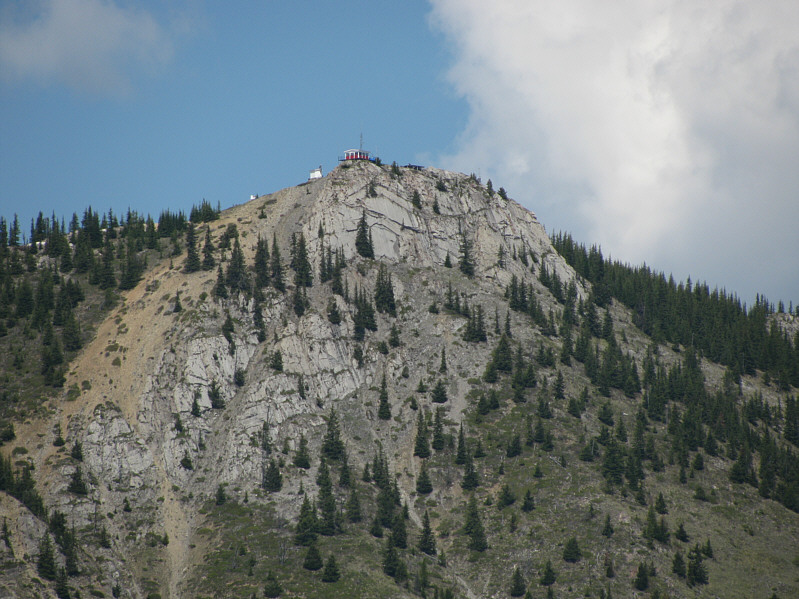 We would eventually scramble around the right side of the final cliffs.