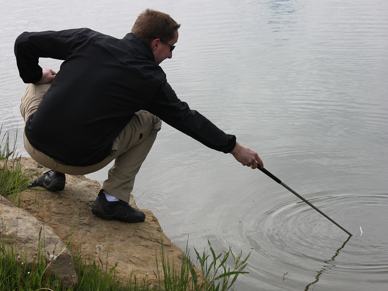 Looks like he's stirring a martini!