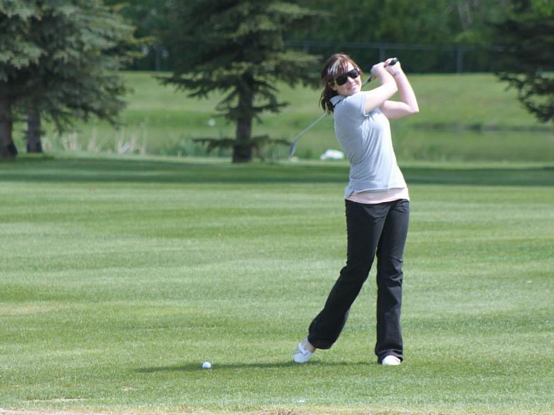 I think she's a better volleyball player than golfer...