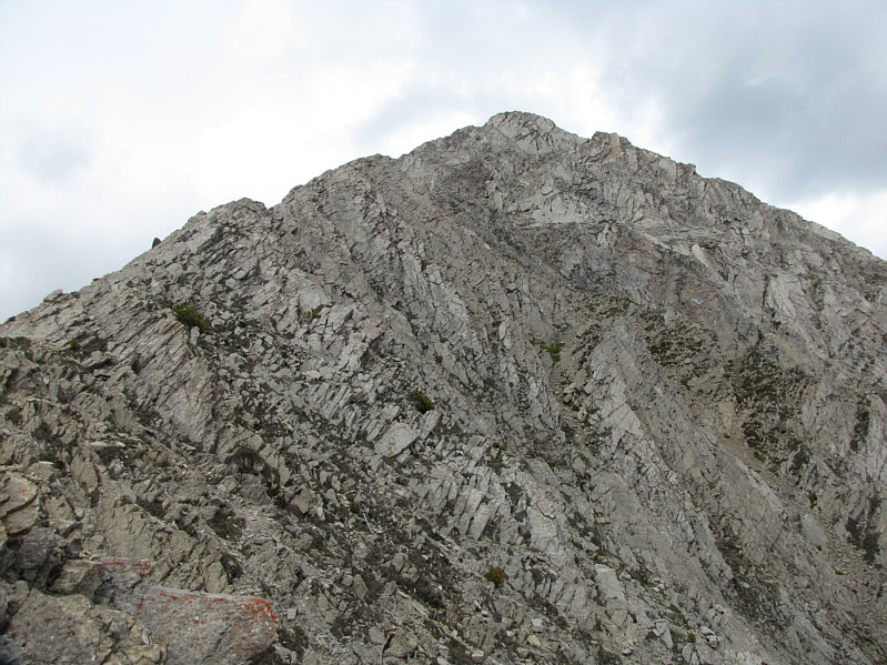 At this point, it's best to stay on the ridge crest or slightly to climber's left.