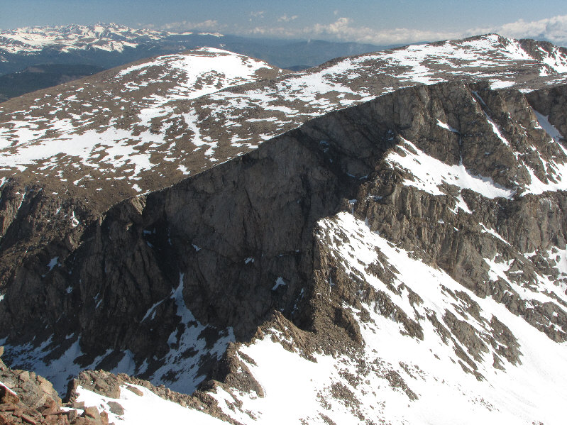 The route was probably doable on this day without an ice axe or crampons, but I felt the reward (Mount Evans) was not worth the risk.