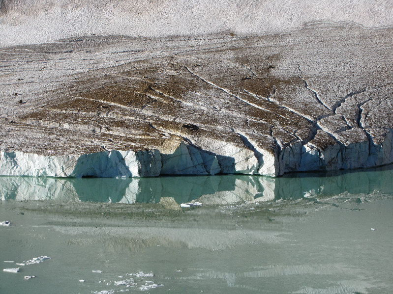 I was fortunate to see--and hear--a big chunk of ice calving into the pond.