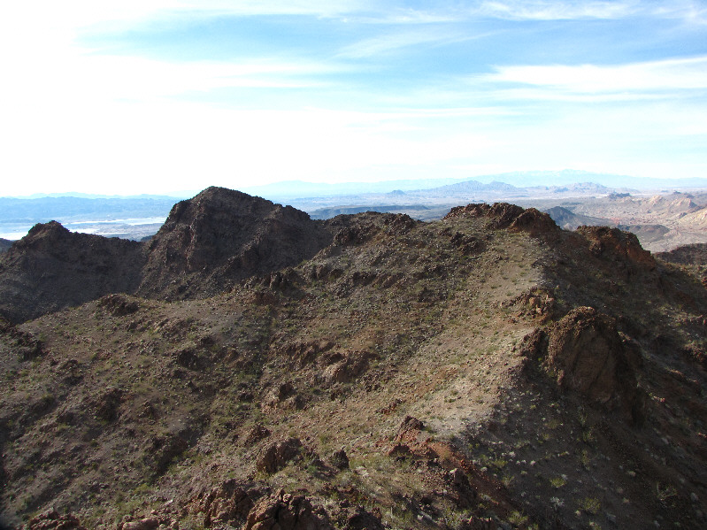 On the USGS topo map, the true summit is correctly designated as the official summit.