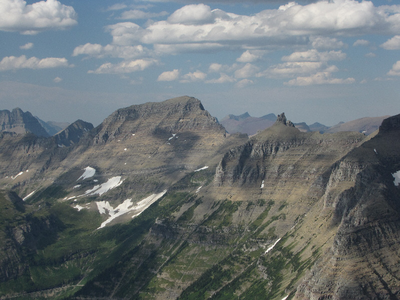 J. Gordon Edwards has a photo of someone on top of Bishops Cap in his guidebook but makes no mention of the peak in his text!