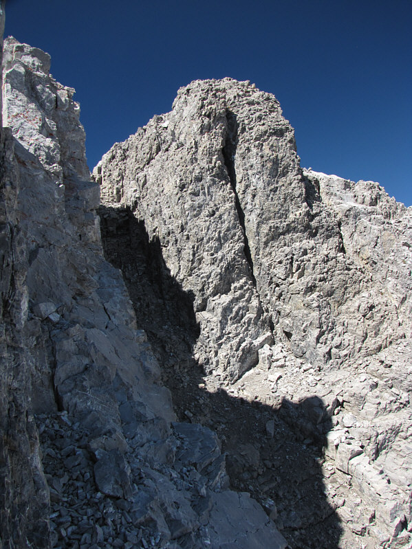 It may be feasible to climb the slabs further to the right...if you don't mind the exposure!