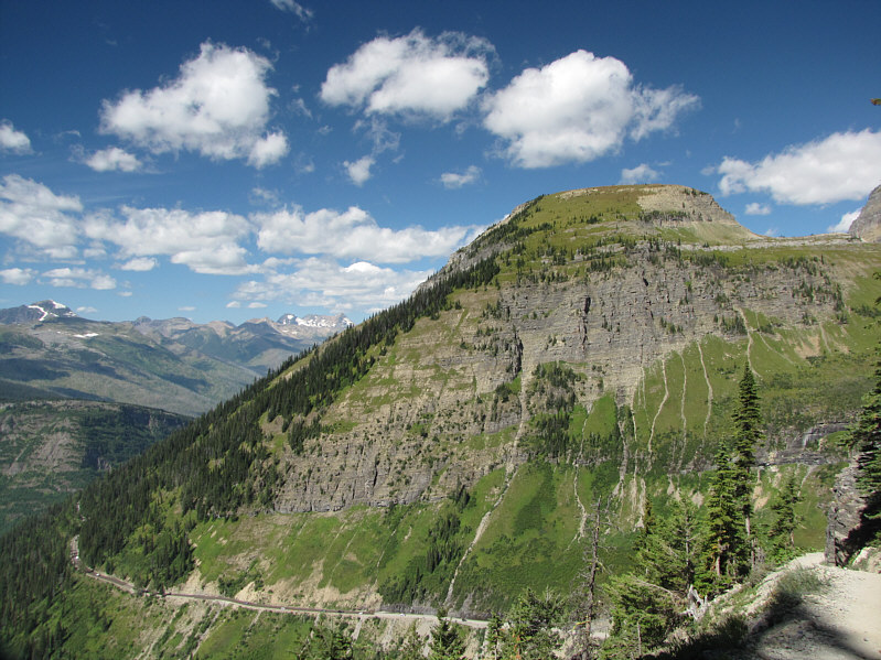 According to Wikipedia, "butte" comes from a French word meaning "small hill". Definitely a misnomer here!