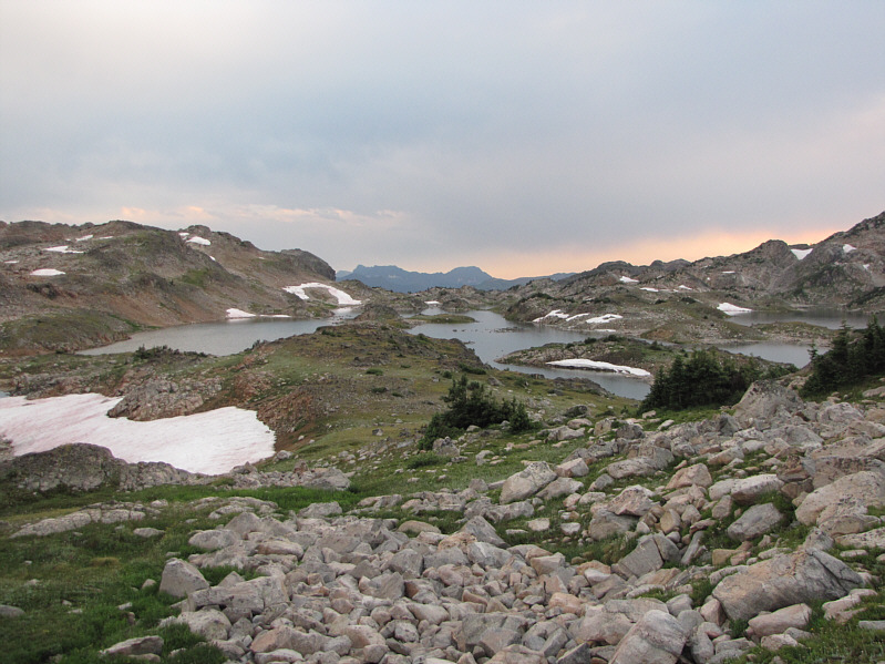 The actual exit route heads left and requires a moderately difficult ford to get to the far bank.
