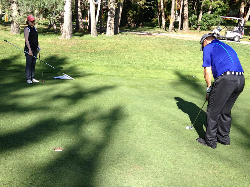 Uphill with a slight break right to left...