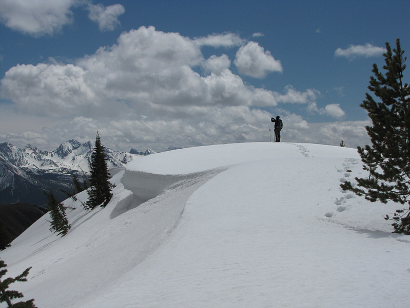 Bob is taking his usual 360-degree summit panorama shots.