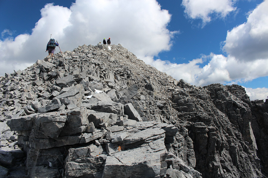 Everyone at the top is already eyeing Haddo Peak on the other side!
