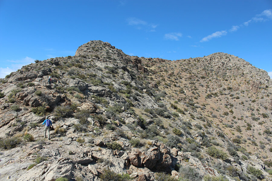 But the summit on the left looks higher...