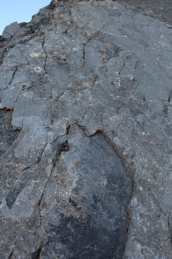 Odd place for the piton, though. Everything below it is easy to down-climb!