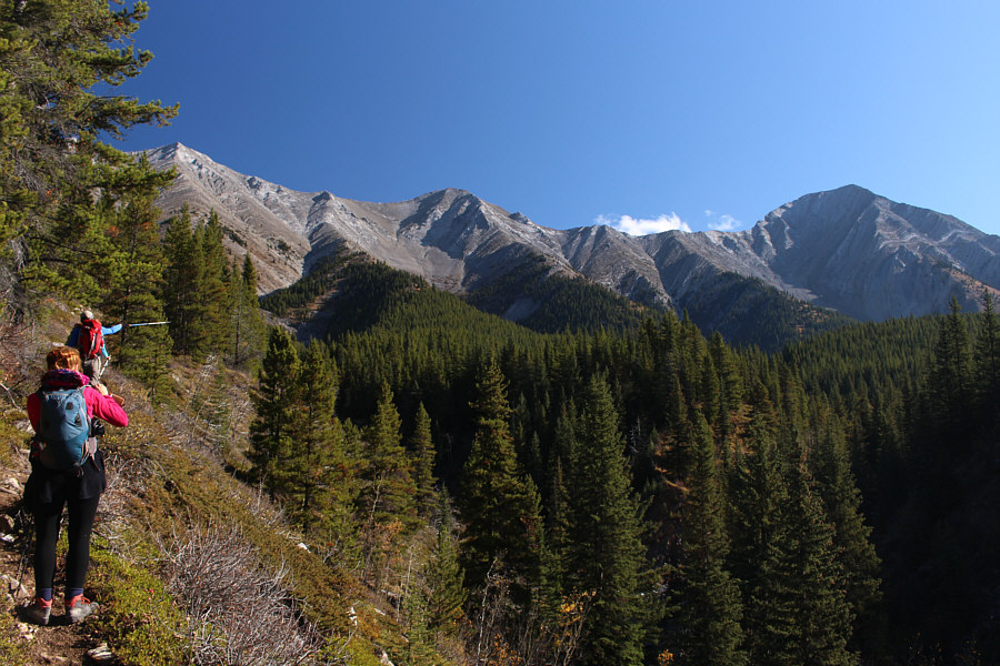 Ali is pointing out where he was hanging by his fingernails on Peak 4!