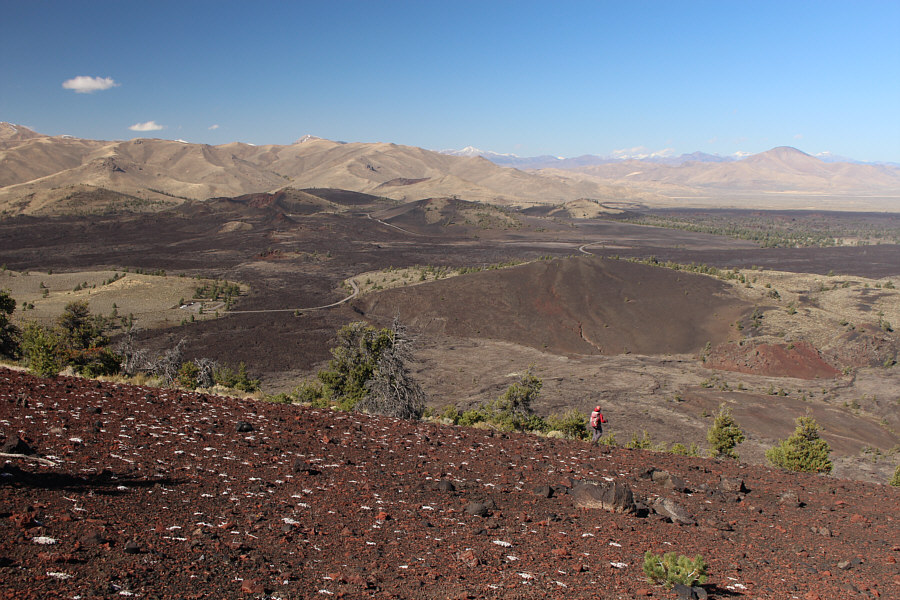 The white spots are some sort of vegetation, but they remind me of snow. And this would be an awesome slope to ski down!