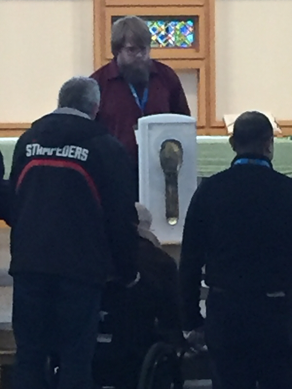 Somebody wanna give the guy in the wheelchair a hand?