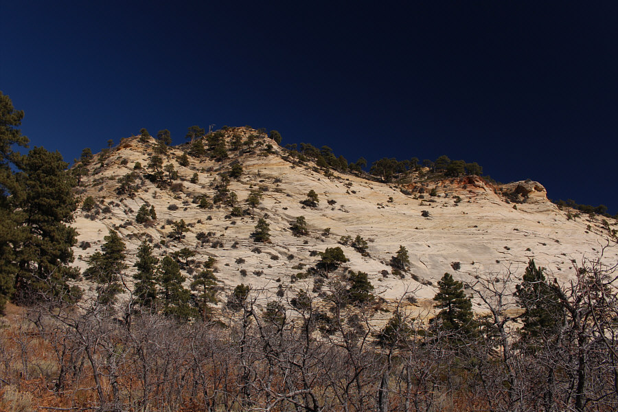 It might be possible to scramble up here, but there is an easier route to the summit...