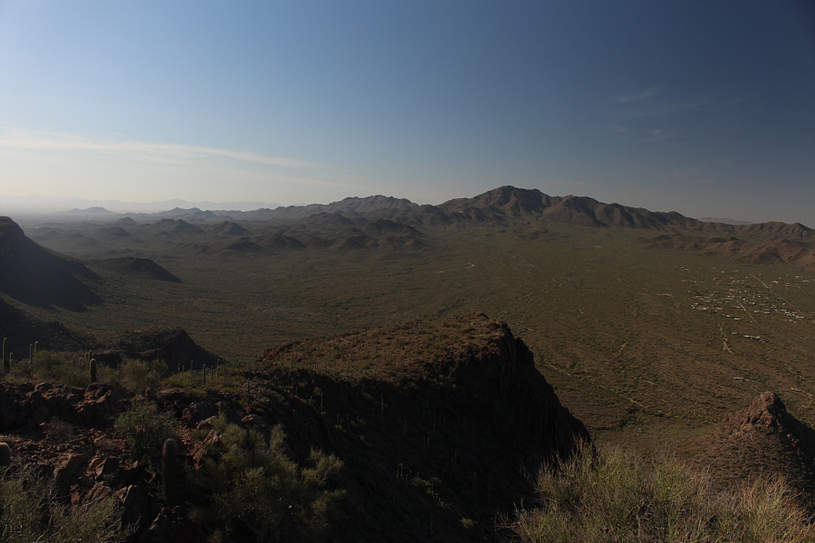 The encroaching development at right is a stark reminder of how small and precious is Saguaro National Park.