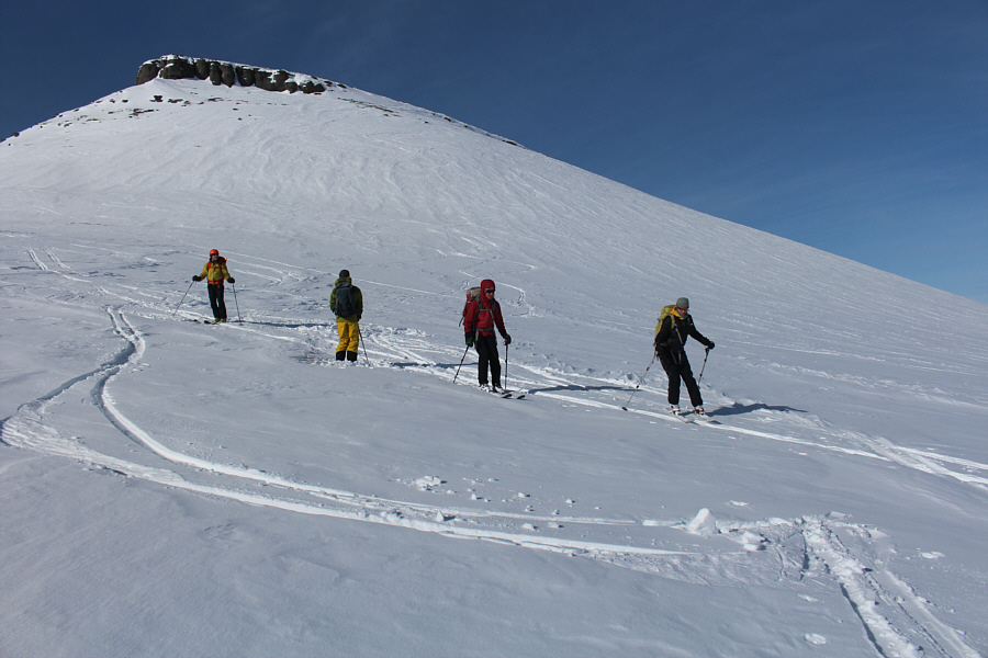 Hmmm...I'm not sure why we didn't just ski down the slope on the right side of the photo instead of retracing our up-track!