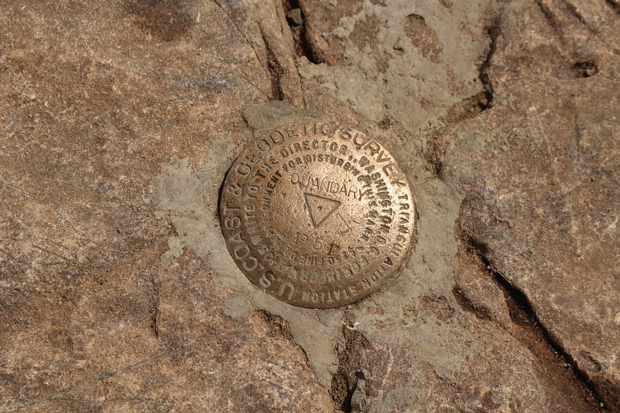 "$250 FINE OR IMPRISONMENT FOR DISTURBING THIS MARK"