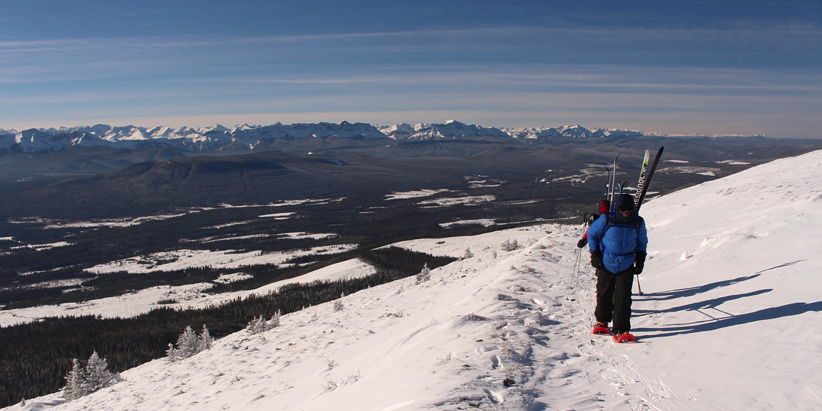 I can't believe they carried those skis all the way up here!