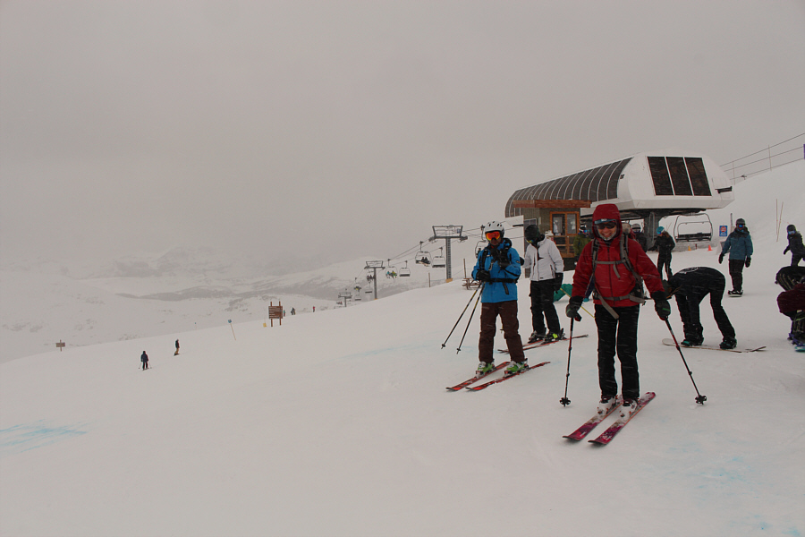 Unfortunately, blowing snow and flat light make for challenging ski conditions.