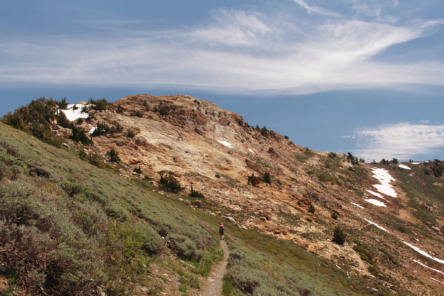 Some parties scramble more directly up via the north ridge at left.