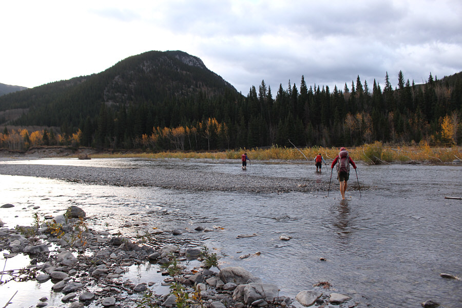 Neoprene socks or hip waders work well here!