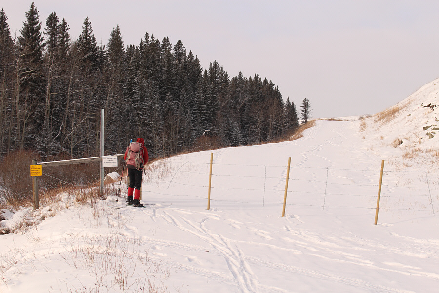 I hate opening and closing these barbed wire fences!