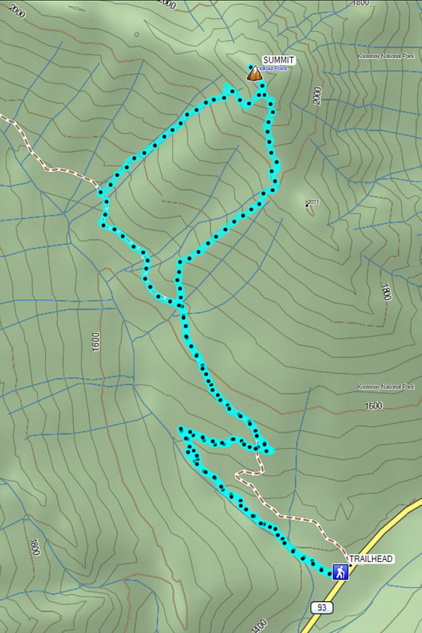 A neglected peak that offers a surprisingly nice balance of easy hiking, moderate bushwhacking (if the right approach is taken), and interesting scrambling.