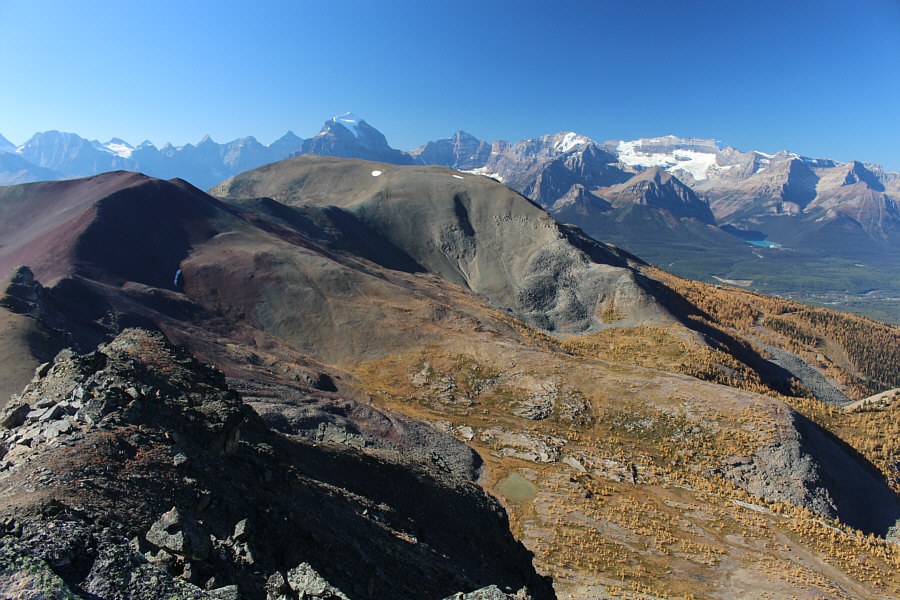 Both mountains look nicer with snow covering them, I think!
