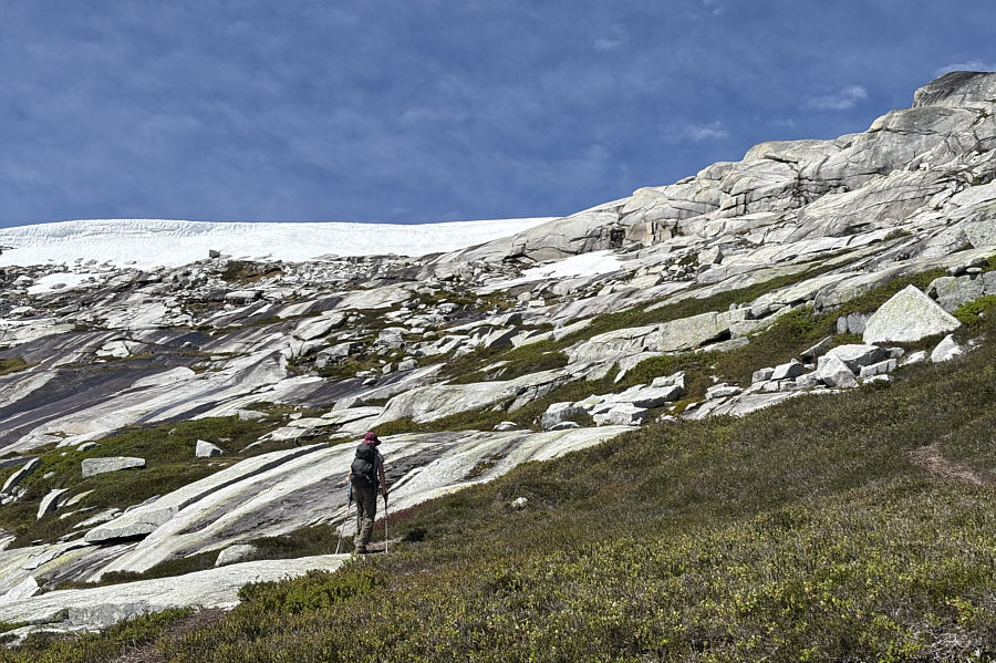 Look for beaten paths and cairns/flagging.