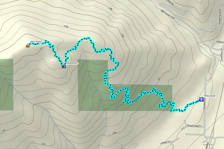 The extension to the true high point is probably only worthwhile to hardcore peak-baggers.