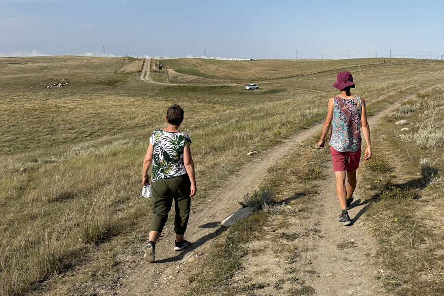 See the truck kicking up dust in the background?